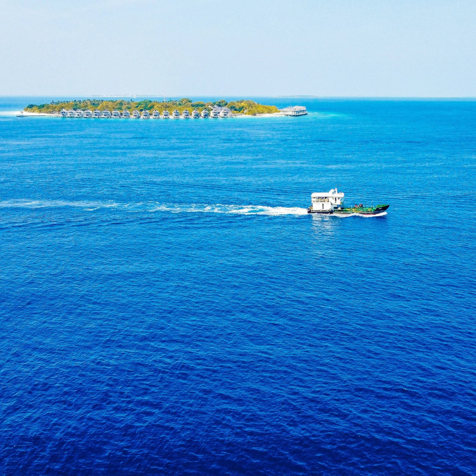 Maldivian resort and boat
